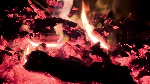Smoldering embers from a large fire at night Video stock 239149406