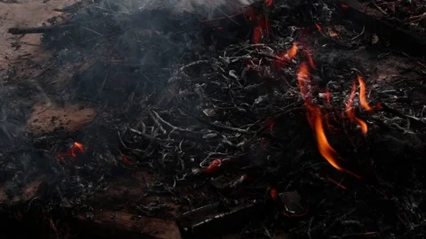 Smoldering fire on the street Stock Footage 113931633