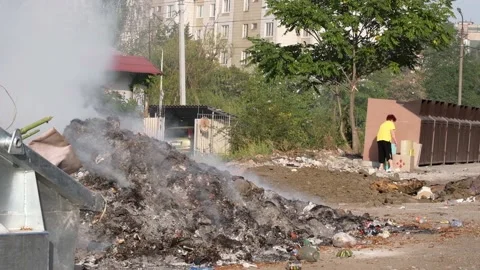 Smoldering garbage at a dump in the city. Stock Footage 139852656