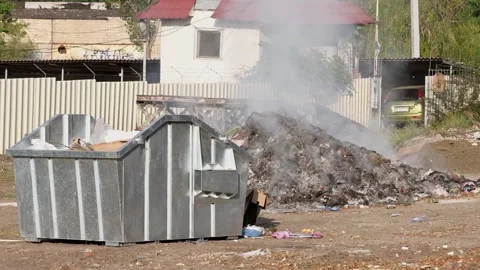 Smoldering garbage at a dump in the city. Stock Footage 139852700