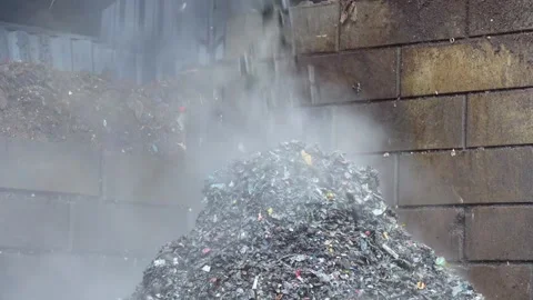 Smoldering Waste and Plastic Pollution at Waste Facility Stock Footage 297737002