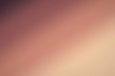 A smooth abstract gradient transitions from muted rose through warm peach t.. Stock-Illustration