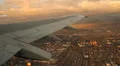 Smooth Aerial of Cape Town Suburbs from Plane Window at Sunset HD Footage