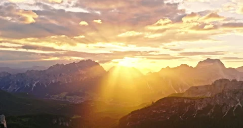 Smooth aerial flight along towering Dolomite cliffs during sunset. Stock-Footage 337515335