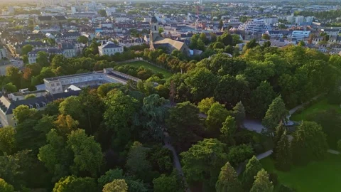 Smooth aerial movement above the Parc du Thabor's parkside with Thabor Stockbeeldmateriaal 286348346