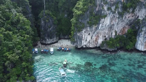 Smooth Aerial View of Monkey Beach, Thailand, Koh Phi Phi Drone Stock Footage 245704997