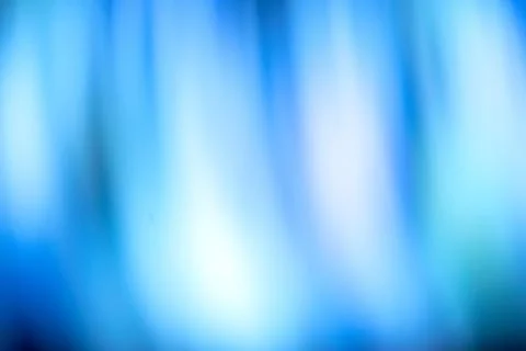 Smooth and blurry gradient background featuring a blend of blue and turquoi.. Stock Photos
