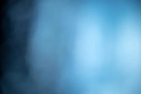 Smooth and blurry gradient background featuring a blend of blue and turquoi.. Stock Photos