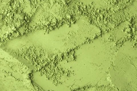 Smooth and rough areas of matcha tea powder form vivid organic texture, off.. Stock Photos