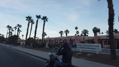Smooth and steady 60 fps motorcycle driving shot during sunny evening Stock Footage 107941142