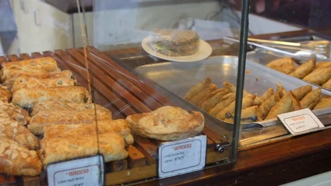 Smooth and steady shoot of bread display in the big supermarket Stock Footage 116712233