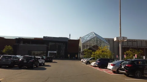 Smooth and steady slow motion shot of Fairview mall on the parking lot Stock Footage 119651274