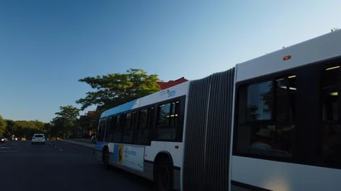 Smooth and steady slow motion driving shot of a public bus STM Stock Footage 119652656