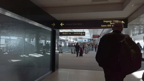 Smooth and steady walk through Denver International Airport Stock Footage 107941265