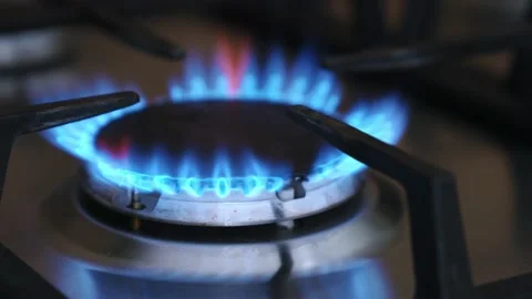 Smooth attenuation of the flame of natural gas on the kitchen gas stove. Stock Footage 220137442