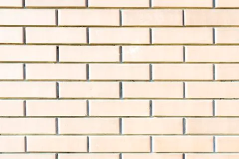 Smooth background or backdrop of a white brick wall. Aligned texture of classic Stock Photos