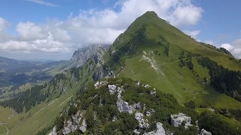 Smooth Backwards Drone Shot Of Alpine Ridge . Sunlight And Some Clouds. Stock Footage 122217553