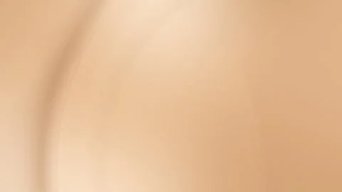 Smooth beige gradient background with soft curves and subtle shadows creating a Stock Footage 299397842