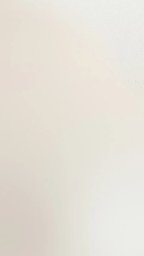 Smooth beige gradient with a subtle texture, perfect for a seamless loop Видео 309855927