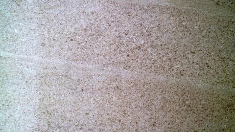 Smooth beige stone texture with natural speckled pattern Stock Photos