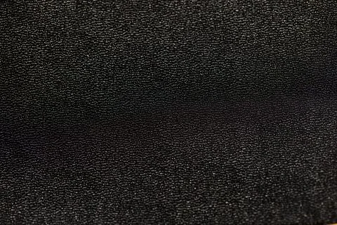 Smooth Black Leather Texture Background with Subtle Shine, Premium Dark Gen.. Stock Photos