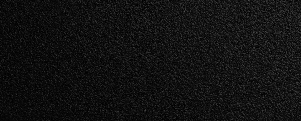 Smooth black plastic grainy pattern surface for background Stock Photos