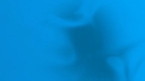 Smooth blue gradient with soft abstract shapes. Seamless loop background. 4K. Stock Footage 300840468