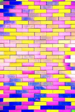 Smooth brick, smooth colored brickwork. Changed color scheme. Colorful backgr Stock Photos