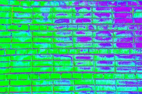 Smooth bricks, smooth brickwork. Changed color scheme. Colorful background. Stock Photos