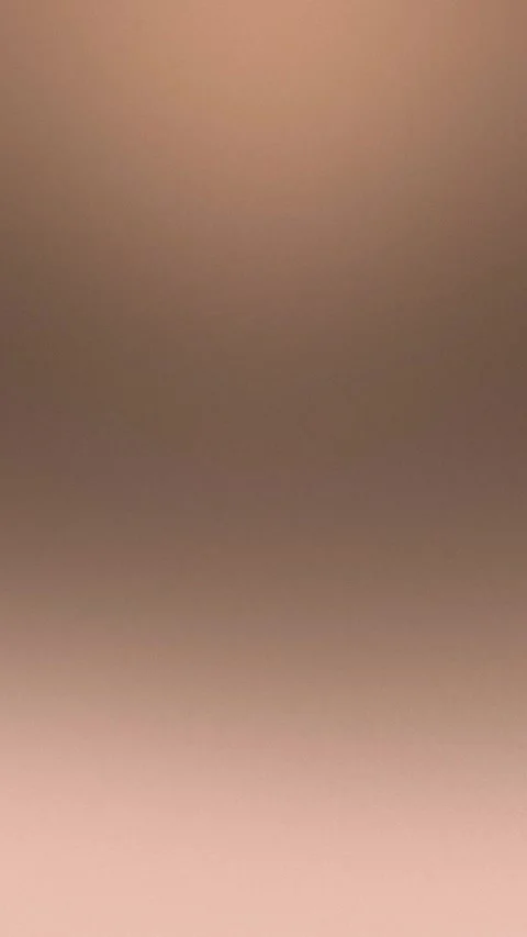 Smooth brown gradient texture forming a seamless loop background. 4K. 库存影片 309957059