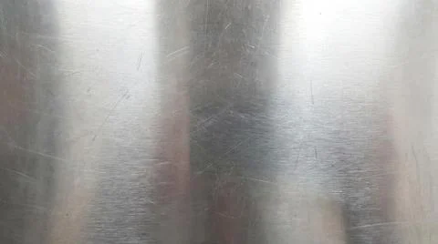 Smooth brushed metal surface with subtle vertical lines and soft light refl.. Stock Illustration