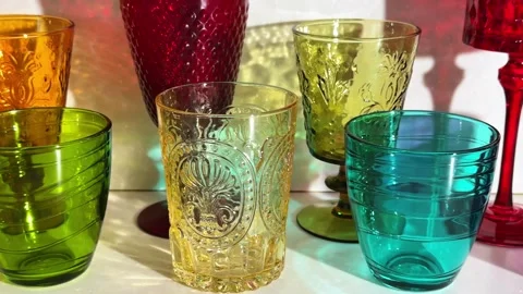 Smooth camera glide past bright tumblers and goblets for home entertaining,.. 스톡 동영상 341324921