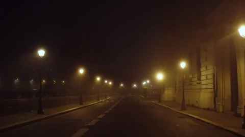 Smooth Camera Motion Through Empty Foggy Streets of Paris at Night Stock Footage 305243237