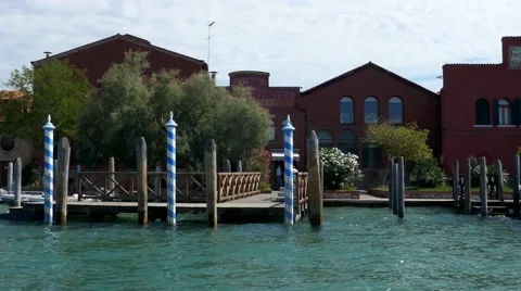 Smooth camera movement from inside water, canals of Venice viewing architecture Stock Footage 68991127