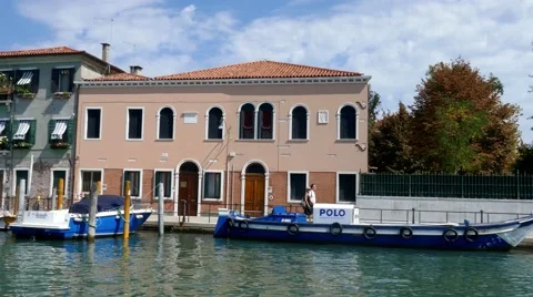 Smooth camera movement from inside water, canals of Venice viewing architecture Stock Footage 68991406