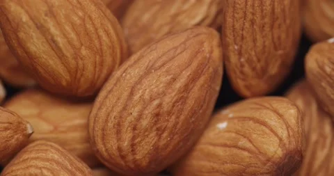 Smooth Camera Movement Over a Handful of Almonds. Видео 142319685