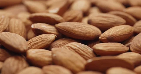 Smooth Camera Movement Over a Handful of Almonds. Stock Footage 142319718