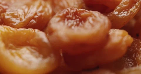 Smooth Camera Movement Over a Handful of Dried Apricots. Stock Footage 142400577