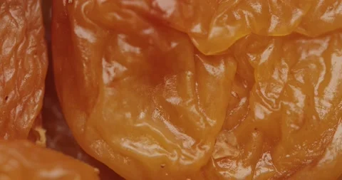 Smooth Camera Movement Over a Handful of Dried Apricots. Stock Footage 142400690