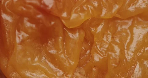 Smooth Camera Movement Over a Handful of Dried Apricots. Видео 142400722