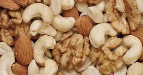Smooth Camera Movement Over a Handful Mix of Nuts. Vidéo 142514249