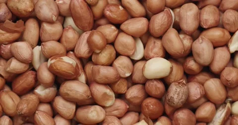 Smooth Camera Movement Over a Handful Peanuts. Stock Footage 142592305