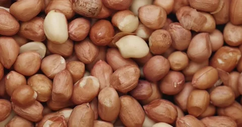 Smooth Camera Movement Over a Handful Peanuts. Видео 142592345
