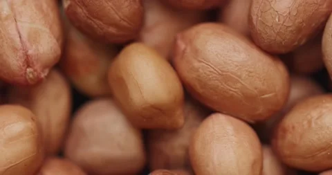 Smooth Camera Movement Over a Handful Peanuts. Видео 142592351