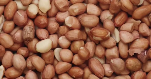 Smooth Camera Movement Over a Handful Peanuts. Stock Footage 142592406