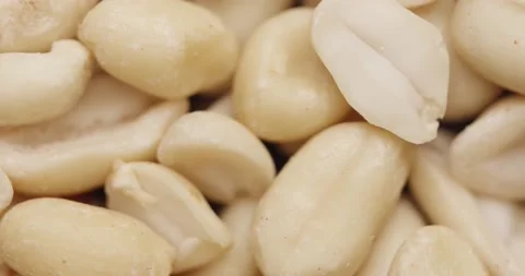 Smooth Camera Movement Over a Handful Peeled Peanuts. Stock Footage 142657545