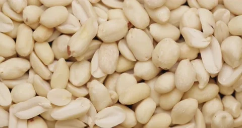 Smooth Camera Movement Over a Handful Peeled Peanuts. Stock Footage 142657549