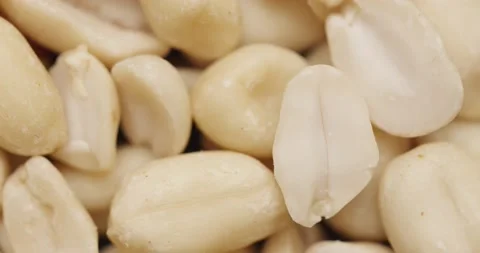 Smooth Camera Movement Over a Handful Peeled Peanuts. Stock Footage 142657614