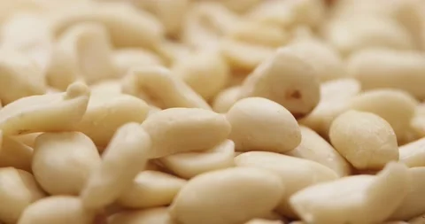 Smooth Camera Movement Over a Handful Peeled Peanuts. Stock Footage 142657667