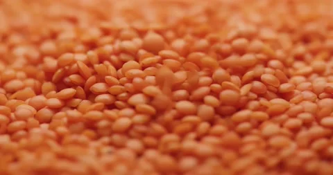 Smooth Camera Movement Over a Handful Red Lentils. Stock Footage 142695657